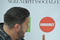 Adam Richman looking at OmNomCT logo LOL